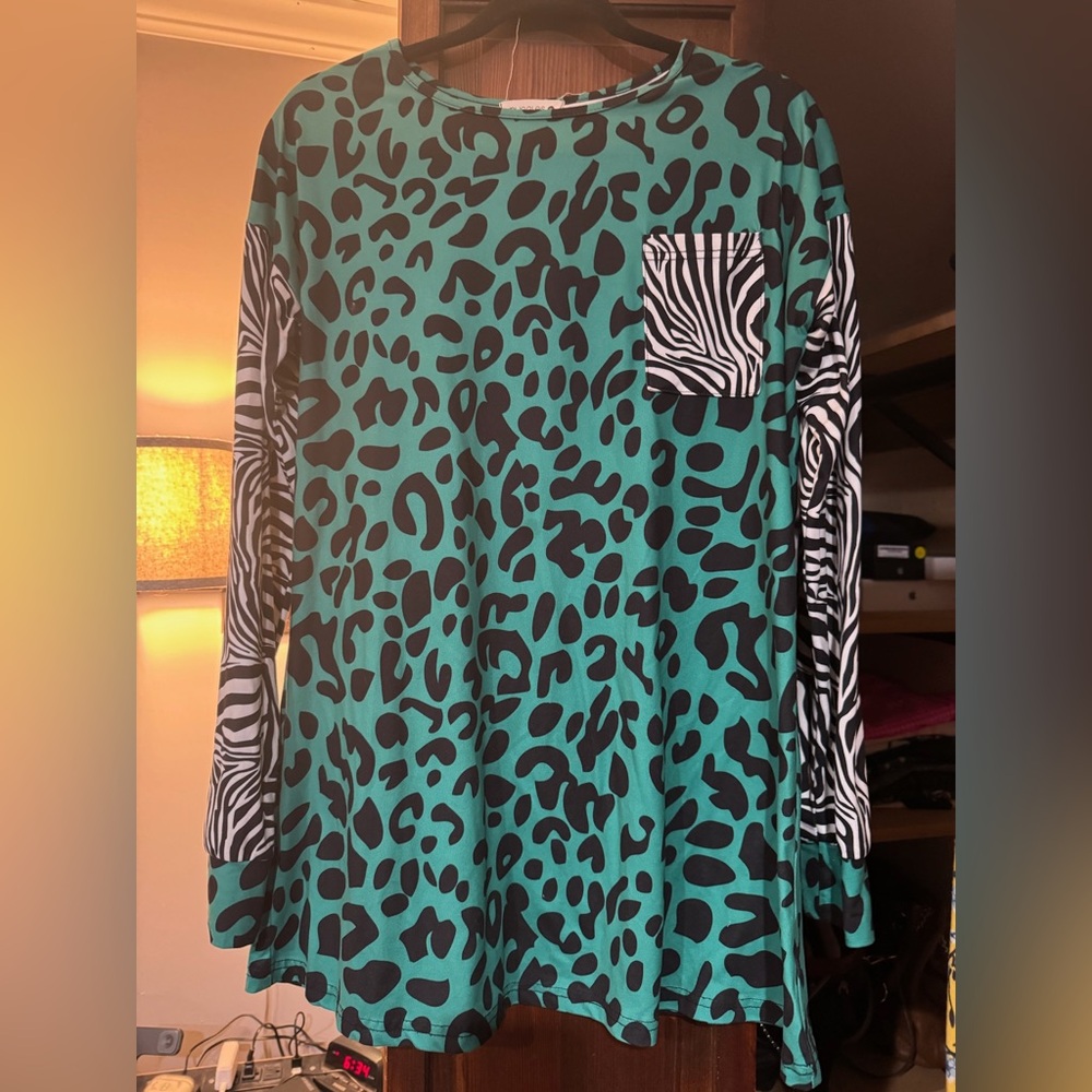 Nuggles Teal and Black Animal Print Long Sleeve Top